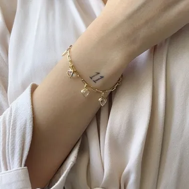 PULSEIRA CARTIER COM CORAÇÃO DE ZIRCONIA PERNDURADA