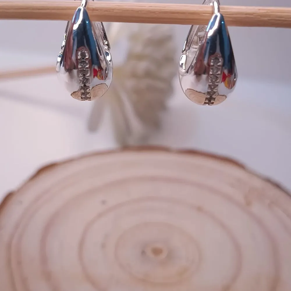 ARGOLA DE GOTA ARTICULADA COM FILEIRA DE ZIRCONIA
