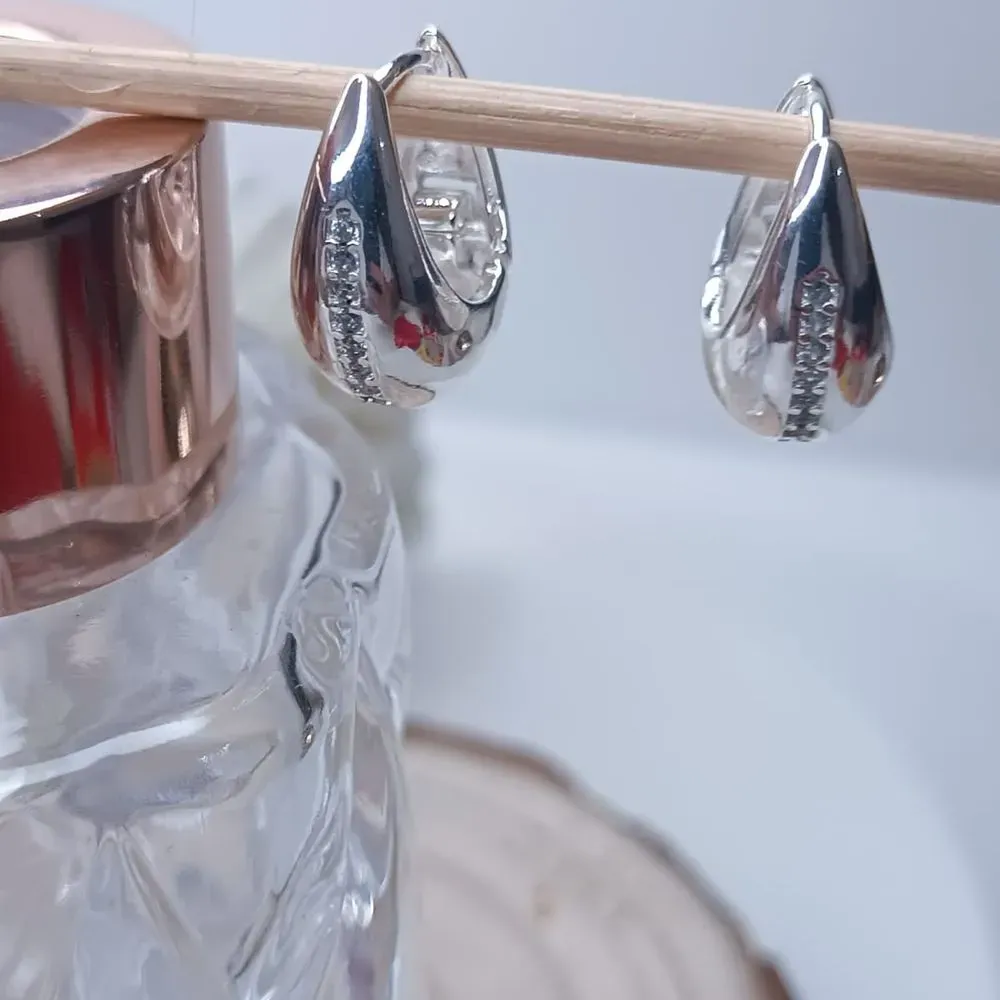 ARGOLA DE GOTA ARTICULADA COM FILEIRA DE ZIRCONIA