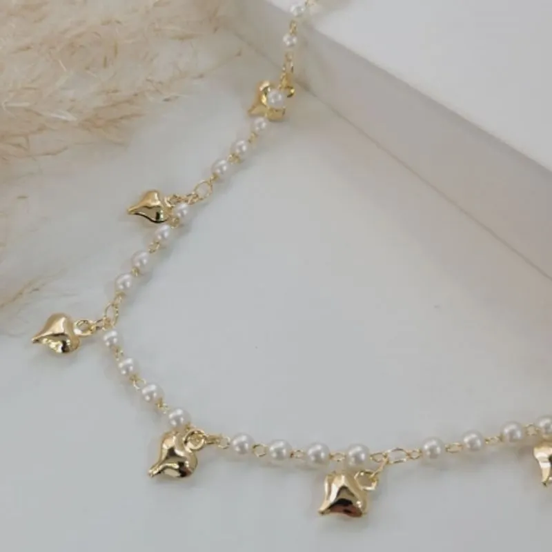 PULSEIRA DE PEROLA COM CORAÇÃO PENDURADO